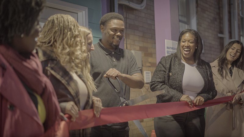 At their solar celebration in October 2025, Rodney from YEAH Philly cut the ribbon to celebrate the organization’s new solar array.